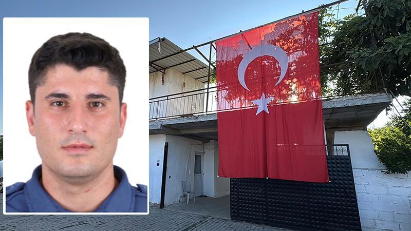 Şehit polis memurunun babaevine Türk bayrağı asıldı